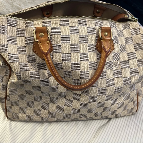 Louis Vuitton Handbags - Louis Vuitton speedy. Grey and white checked.